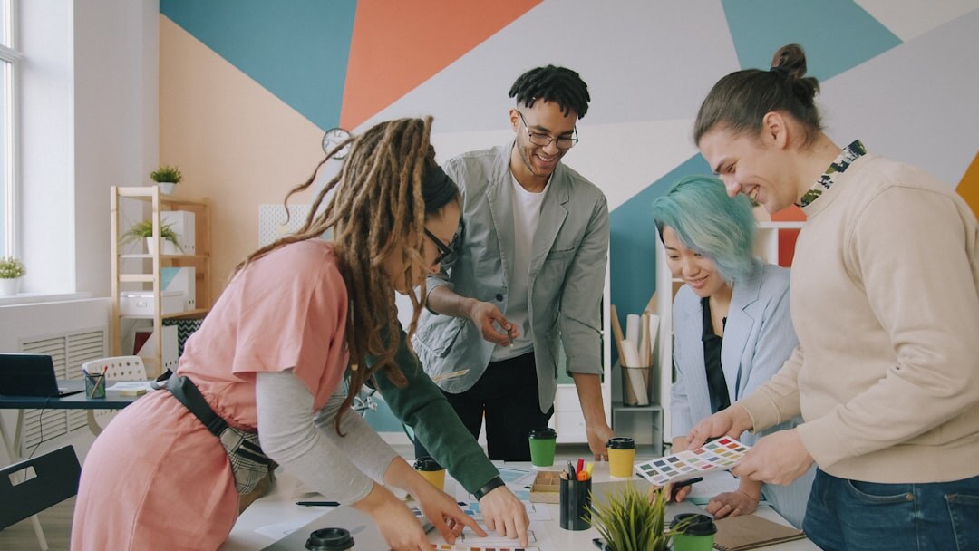 Coworkers solving a puzzle together in an escape room challenge